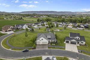 Aerial view of residential area with a mountainous background