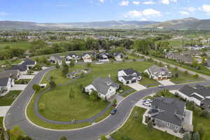 Aerial overview of property's location featuring nearby suburban area