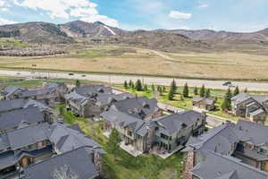 Aerial view of residential area with a mountain backdrop