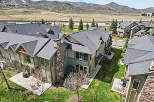 Aerial view of residential area with a mountainous background