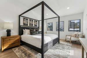 Bedroom featuring light wood-type flooring and recessed lighting