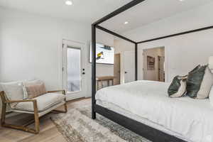 Bedroom featuring light wood-style floors and recessed lighting