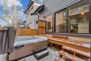 View of patio / terrace featuring a hot tub