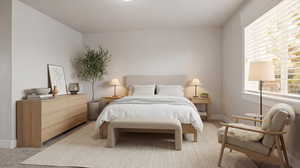 Bedroom with baseboards and carpet floors