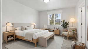 Primary Bedroom with light colored carpet