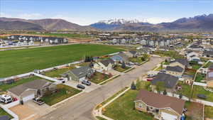 Aerial perspective of suburban area featuring mountain views