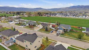 Aerial view of residential area with a mountainous background