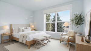 Bedroom featuring baseboards and light carpet