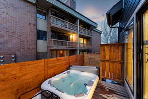 View of patio / terrace featuring a hot tub