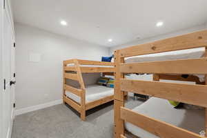 Bedroom featuring recessed lighting and light colored carpet