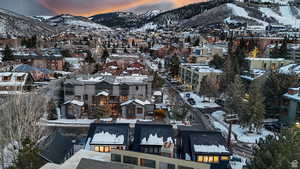 Snowy aerial view with a mountain view