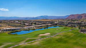 View of home's community with a residential view, golf course view, and a water and mountain view