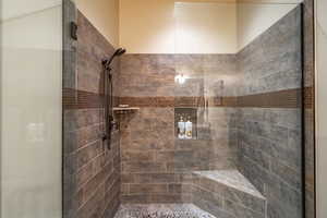 Full bath featuring a stall shower