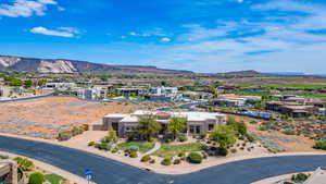 Aerial view of residential area featuring a mountain backdrop