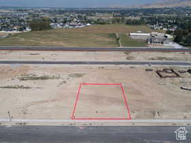 Aerial view of property's location featuring property parcel outlined