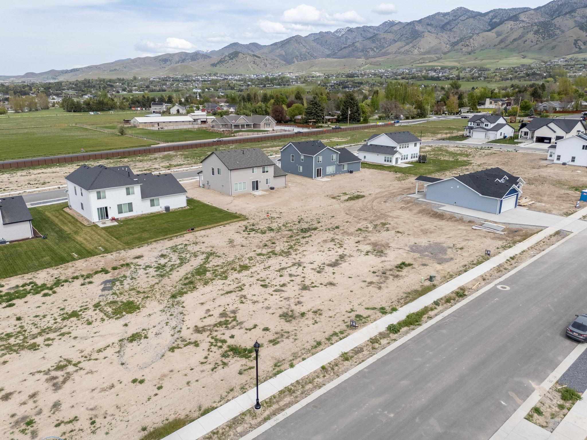 Aerial view of residential area with mountains