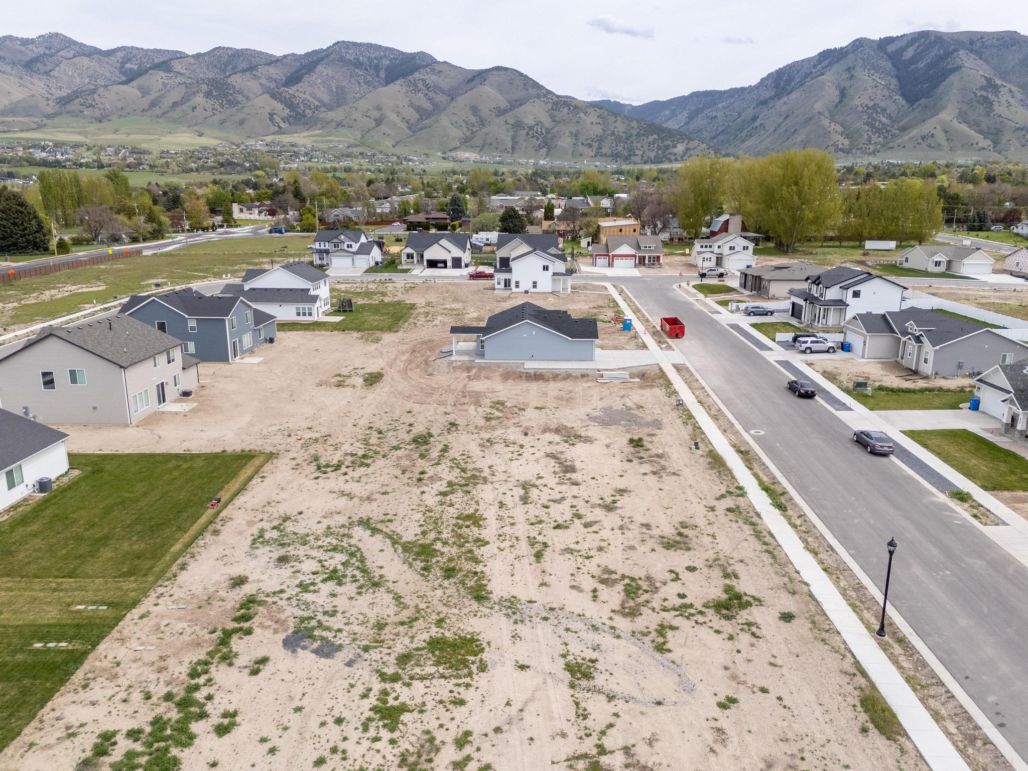 Aerial view of residential area with a mountainous background