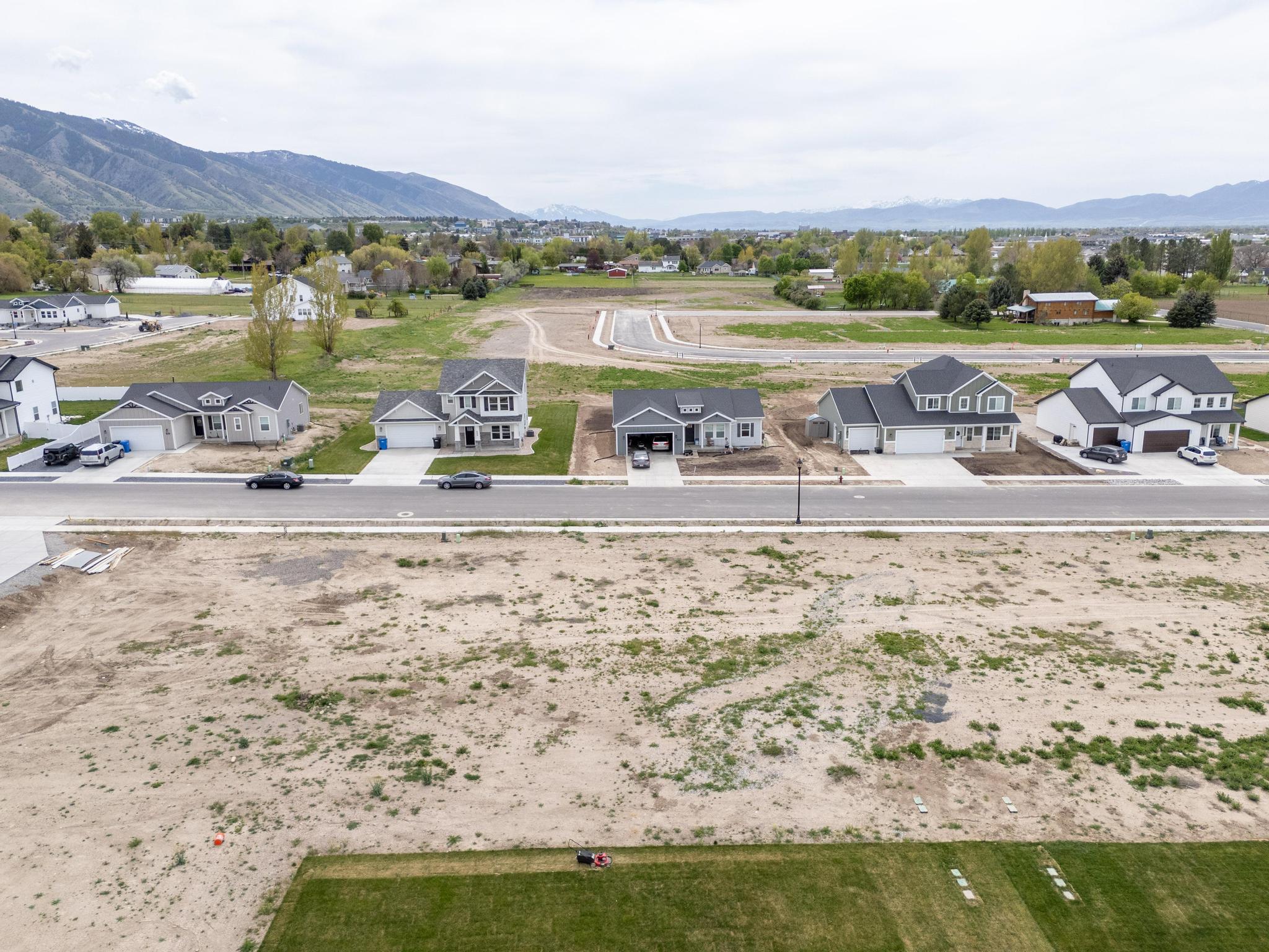 Aerial view of residential area with a mountainous background