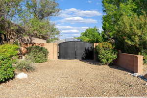 View of yard with a gate