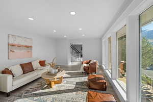 Living area with recessed lighting and wood finished floors