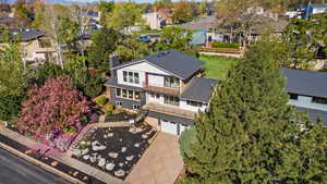 Aerial view of residential area with a tree filled landscape
