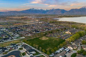 Aerial view of residential area featuring a water and mountain view