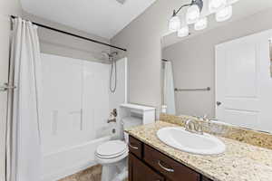 Full bath with vanity and shower / bathtub combination with curtain