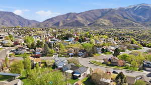 Aerial view of residential area featuring mountains