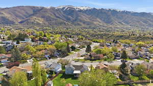 View of property location with nearby suburban area and a mountainous background