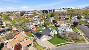 Aerial perspective of suburban area featuring mountains