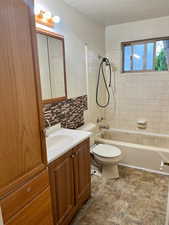 Full bathroom featuring vanity and bathtub / shower combination