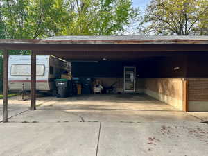 Garage featuring driveway