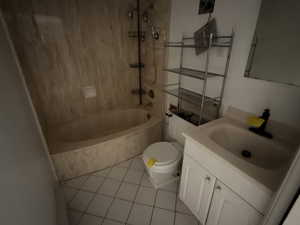 Full bathroom with vanity, light tile patterned floors, and a combined bath / shower with marble appearance