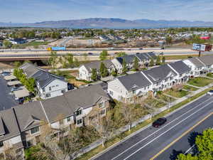 Aerial view of residential area with a mountain backdrop