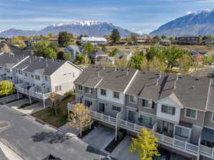 Aerial perspective of suburban area with a mountain backdrop