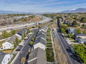 View of property location featuring nearby suburban area and a mountainous background
