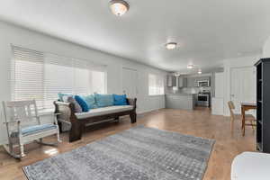 Living room with light wood finished floors