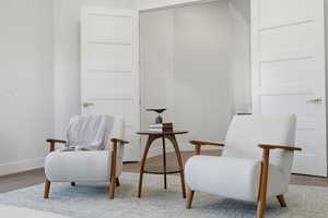 Sitting room with light wood finished floors