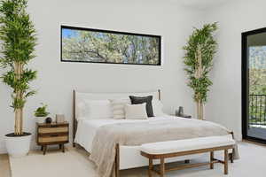Bedroom with access to exterior and multiple windows