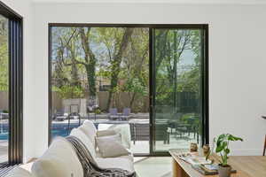 Living area featuring wood finished floors and plenty of natural light
