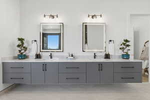 Bathroom with double vanity and ensuite bathroom
