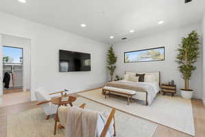 Bedroom featuring light wood-style flooring and recessed lighting