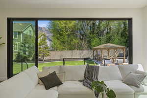 Sunroom with a mountain view