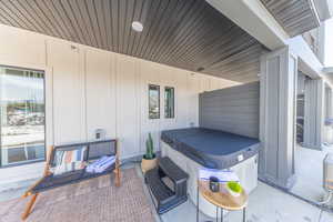 Large private patio with hot tub