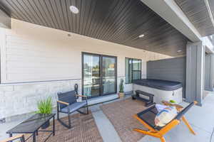 Patio with private hot tub.