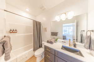Hall bathroom with tub & shower combo