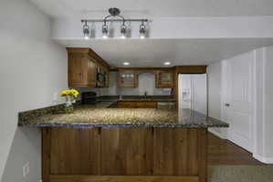 Kitchen with glass fronted cabinets