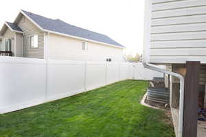 View of fenced backyard