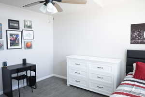 Bedroom with baseboards and a ceiling fan