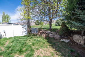 View of private back yard with views of the golf course. HOA mowed the day aftr these photos were taken :-) Has been reseeded to resolve patches.